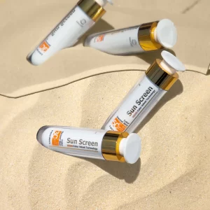 Frezyderm sunscreen on the sand